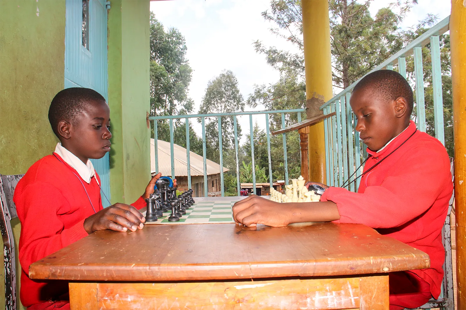 Students playing chess at Sikri Sports Academy in Oyugis
