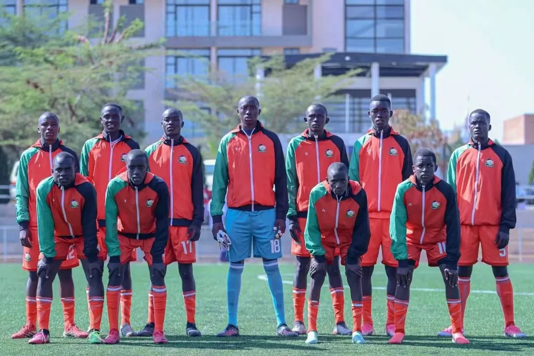 Kenya U-15 Boys' National Team lining up in orange and green tracksuits at the CECAFA qualifiers in Kigali